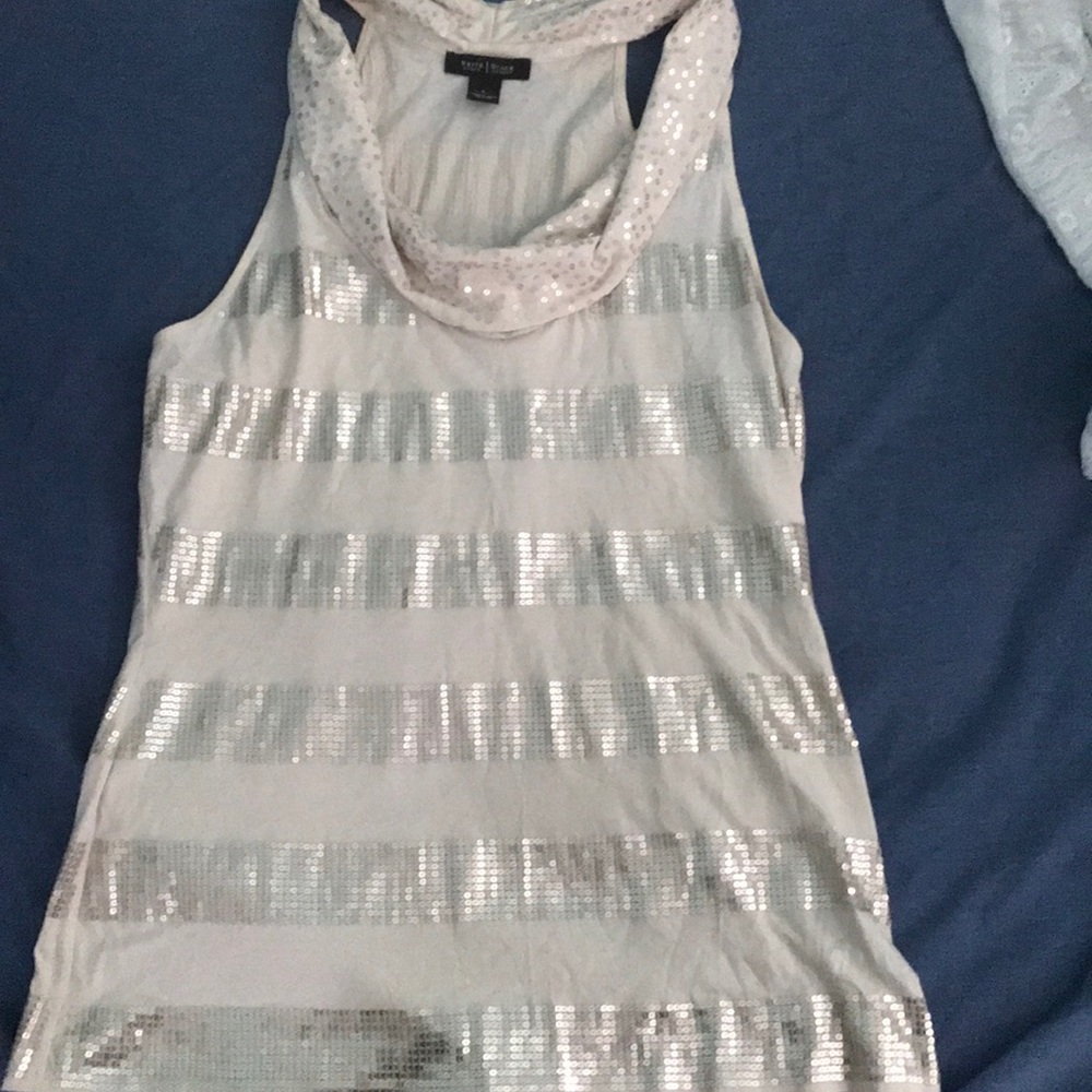 Beautiful! Beige, racer back sleeveless shirt.